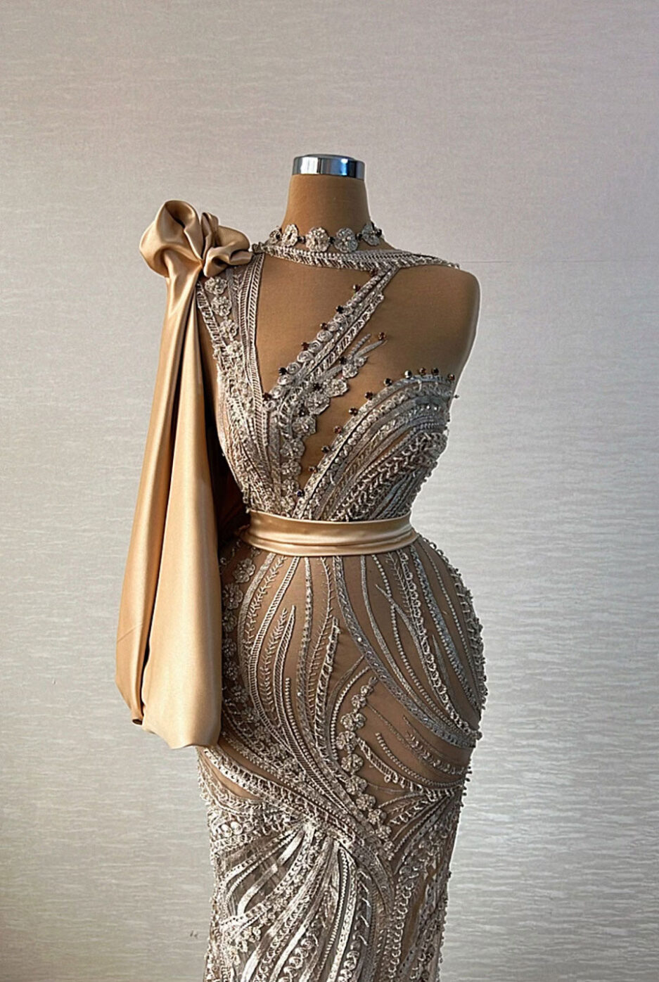 Long Silver Lace Intricated Details Dress with a golden Shoulder