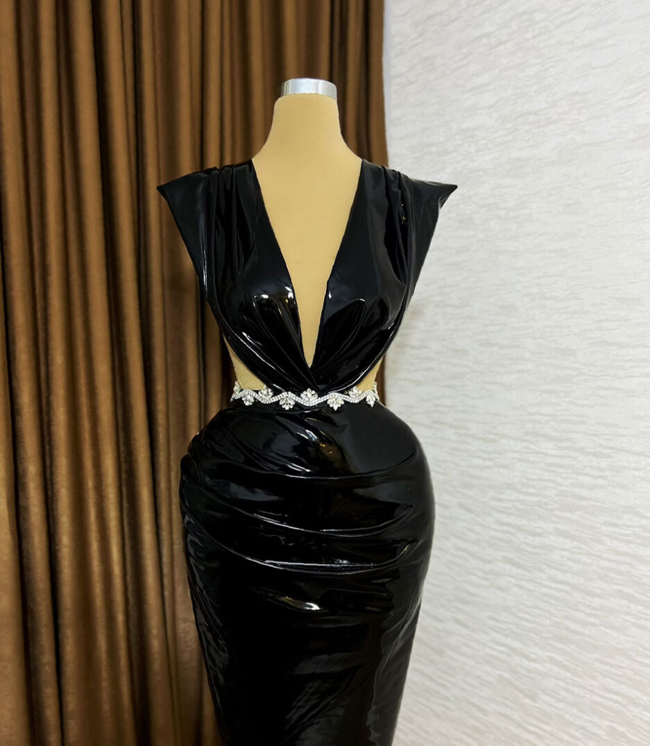 Long Latex Dress with Deep Cut Bodice and Details Intricate Waist