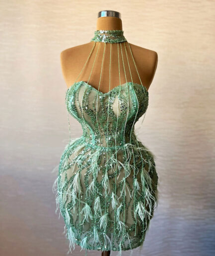 Short Mint Dress with Intricate Details and Unique Neckline