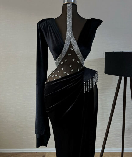 Long Black Dress with Intricate Silver Details and Long Tail