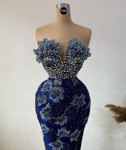 Long Blue Dress with Floral Design and Embellishments