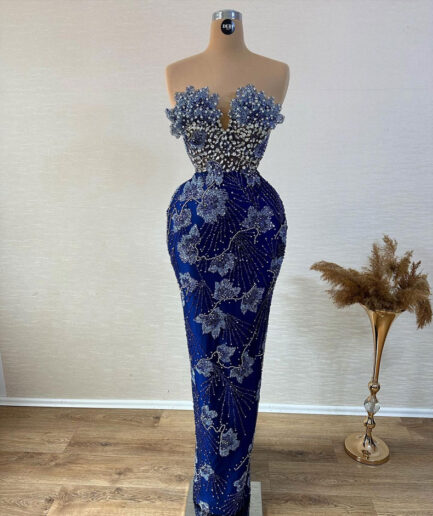 Long Blue Dress with Floral Design and Embellishments