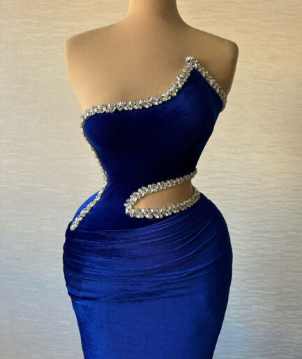 Long Blue Dress with Embellished Bodice and Unique Cuts