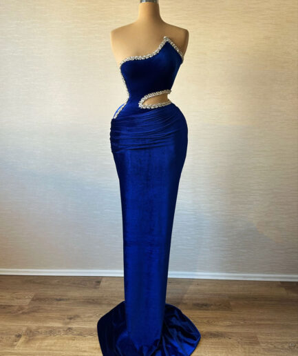 Long Blue Dress with Embellished Bodice and Unique Cuts